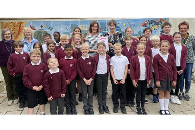 All Saints’ Church of England Junior School pupils, foundation governors, and Mrs Garrett, global citizens leader and Sandra Sutherland, headteacher). Photo supplied