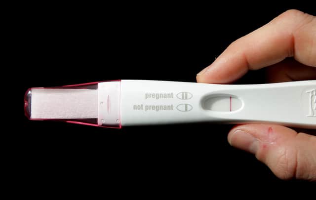 A home pregnancy test, and its instructions.
