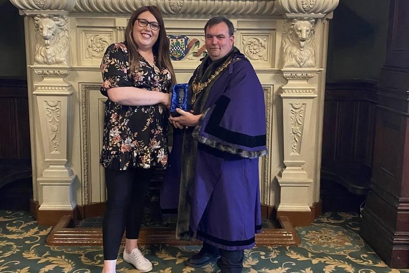 Alex Pearson received an award for fundraising for local charities and community organisations. The Mayor has been impressed by Alex's dedication to raising money for local causes and charity campaigns. A recent example is a 20-mile sponsored walk for Safeline which raised £820.