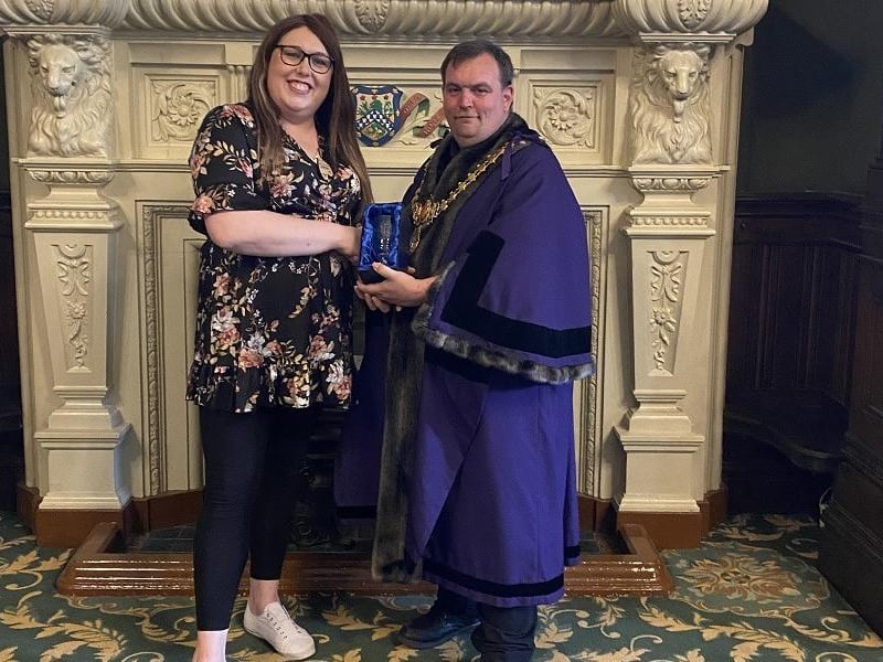 Alex Pearson received an award for fundraising for local charities and community organisations. The Mayor has been impressed by Alex's dedication to raising money for local causes and charity campaigns. A recent example is a 20-mile sponsored walk for Safeline which raised £820.