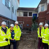Members of the children ward’s project team stood where the new play and sensory spaces will be. Photo supplied