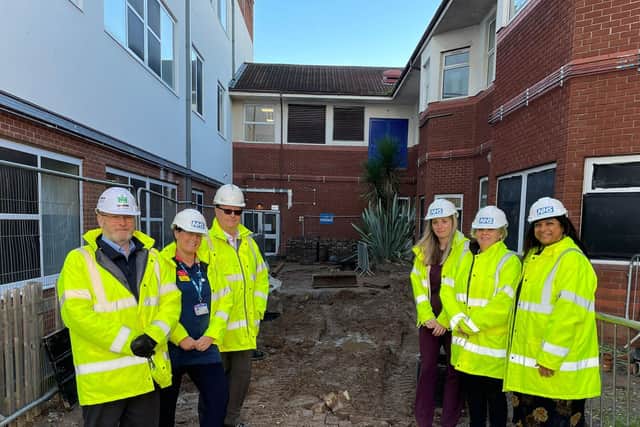 Members of the children ward’s project team stood where the new play and sensory spaces will be. Photo supplied