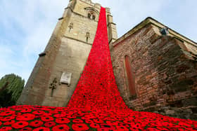 The poppy cascade outside St Peters Church in Wellesbourne (Joseph Walshe / SWNS)