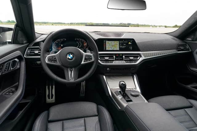 Sports seats and BMW's latest iDrive media system are standard