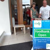 David Proffitt-White delivers another trolley full of eggs and other food to the Warwick District Foodbank drop-off at  St Paul's church with his friend Marion Colman. Photo by Oliver Williams.