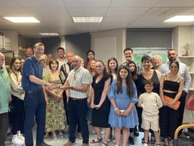 Turpin family members hand over the award to Huw Jones at Leamington Art Gallery & Museum. Picture submitted.