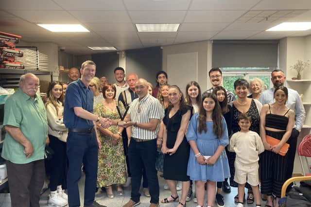 Turpin family members hand over the award to Huw Jones at Leamington Art Gallery & Museum. Picture submitted.