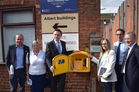 Cllr Simon Ward; Karen Herrington; Will Quince MP, Minister of State for Health and Secondary Care; Naomi Issitt; Cllr Yousef Dahmash and Mark Pawsey MP with the OurJay Defibrillator installed at Mark’s constituency office.