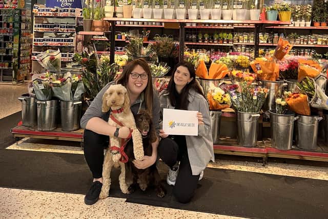 Morrisons Community Champion Alex Pearson with her dogs Archie and Chester and Susan Rutherford from LWS Night Shelter. Photo supplied