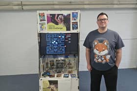 Danny Cronin with the retro arcade he created to support Guide Dogs' 250 challenge. Picture supplied.