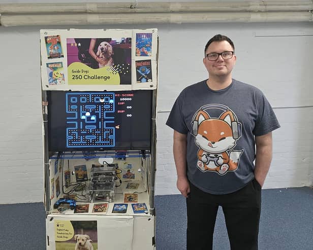 Danny Cronin with the retro arcade he created to support Guide Dogs' 250 challenge. Picture supplied.