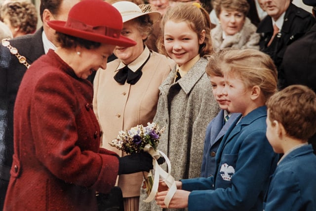 The Queen during her visit to officially open the Royal Priors Shopping Centre in Leamington in 1988. She also unveiled a plaque at the town hall to commemorate the 150th anniversary of Queen Victoria's granting of the royal warrant to Leamington.