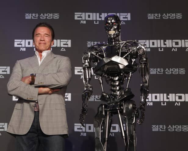 'The Terminator' (left) who was played on film by Arnold Arnold Schwarzenegger. Photo: Chung Sung-Jun/Getty Images.