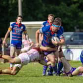 Louis Dunbavin on a charge, with new skipper, Joe Kinghorn in attendance.