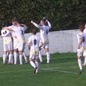 Racing celebrate Cal Templeton's opener v Wulfrunians.