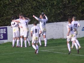 Racing celebrate Cal Templeton's opener v Wulfrunians.