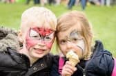 A library picture of children having fun at a previous Rugby Spring Fair.