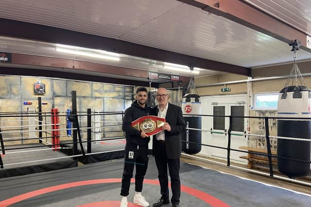 Danny Quartermaine is congratulated by Matt Western MP for winning the IBF European Super Featherweight belt. Picture supplied.