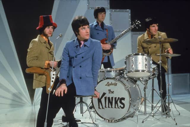 The Kinks, (L-R) Dave Davies, Ray Davies, Peter Quaife, and Mick Avory, wait on the set of a television show, ready to perform, 1968. (Photo by Hulton Archive/Getty Images)