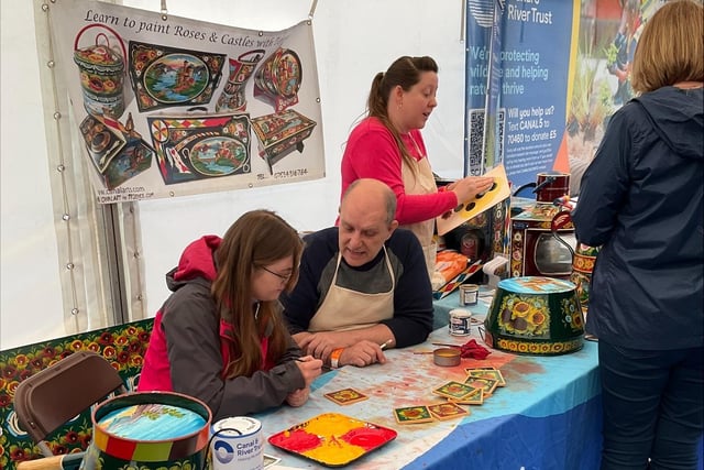 Roses & Castles painting at the Canal & River Trust Marquee.