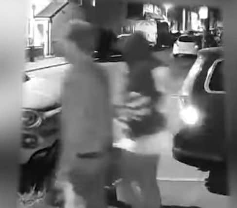 Watch: Police release video of two people they want to speak to in ...