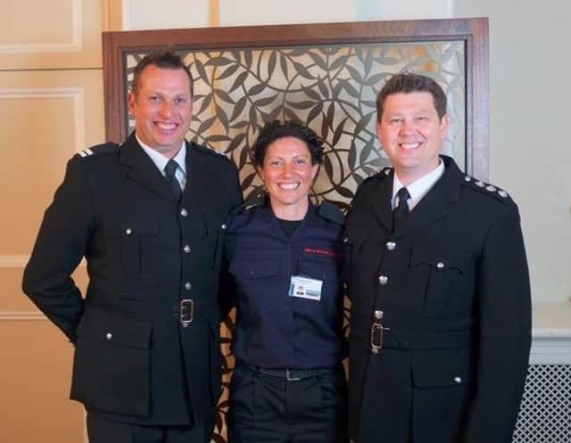 Fire Station Manager Dave Edge (right), with Crew Manager Daniel Evans – having both been awarded their 20 years’ service medals – joined by Phillipa Blair (centre) who was presented with the Chief Fire Officer’s Commendation. (photo from Oxfordshire County Council)