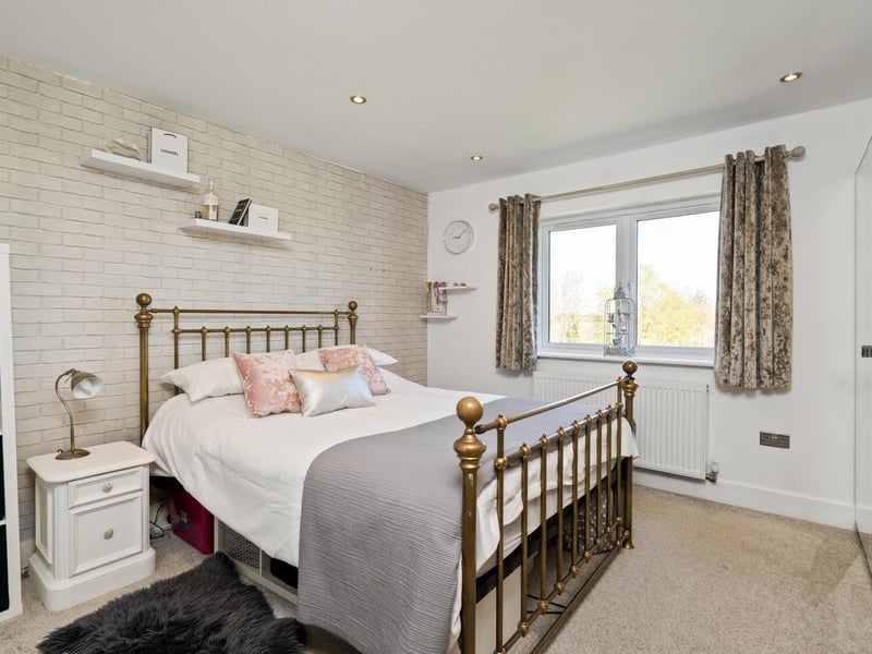 One of the bedrooms. Photo by DM & Co. Homes