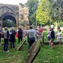 A guided tour at the Abbey ruins in Abbey Fields in Kenilworth