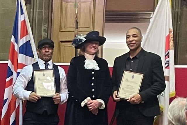 Sophie Hilleary, Warwickshire’s High Sheriff 2023/24, presents the awards to the boxing coaches.