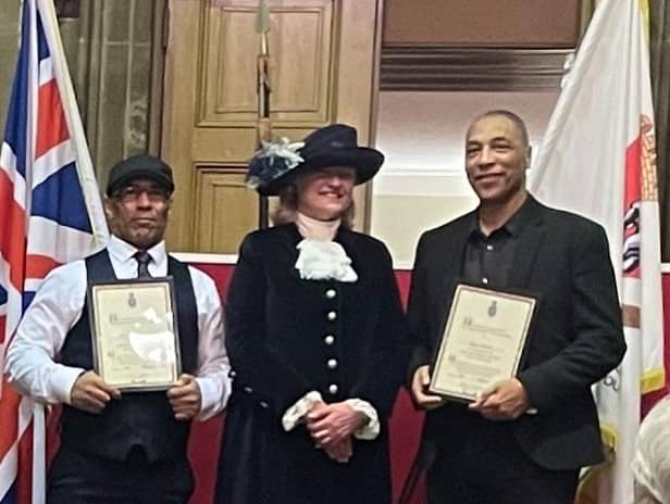 Sophie Hilleary, Warwickshire’s High Sheriff 2023/24, presents the awards to the boxing coaches.