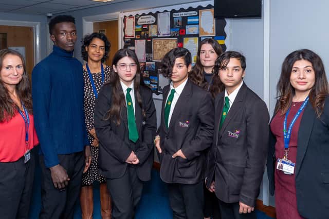 Some of the pupils at Trinity Catholic School, are refugees, who have recently shared their stories. Credit: Mike Baker.