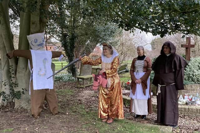 A dramatic moment from the church's Tudor Shrove Tuesday event.