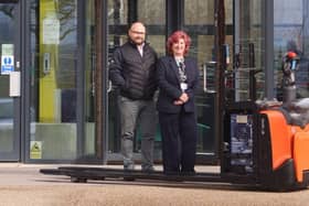 Emerging Technology Delivery Manager Craig Line and MTI Operations Director Lisa Bingley with the Toyota Levio LPE 220 powered pallet truck