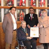 The presentation took place at the council chamber and pictured in front of Dr Shera''s mayoral portrait are Bishop Yousaf Nadeem Bhinder, of His Grace Churches International; Dr Shera; Samuel Payara, chair of Implementation Minority Rights Forum Pakistan and director of Bright Futures Society Pakistan; and Labour's Rugby constituency chair Cllr Barbara Brown.