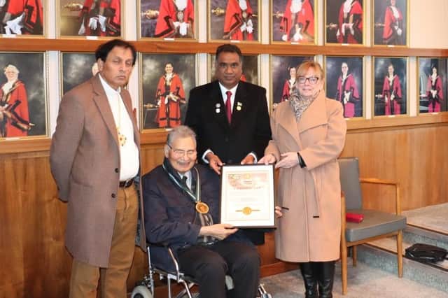 The presentation took place at the council chamber and pictured in front of Dr Shera''s mayoral portrait are Bishop Yousaf Nadeem Bhinder, of His Grace Churches International; Dr Shera; Samuel Payara, chair of Implementation Minority Rights Forum Pakistan and director of Bright Futures Society Pakistan; and Labour's Rugby constituency chair Cllr Barbara Brown.