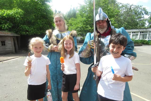 A knight and princess from Warwick Castle visited the children at Emscote Infant School alongside an ice cream van. Pupils left to right: Alice, Betsy and Uygar. Photo supplied
