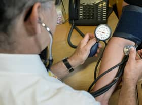 EMBARGOED TO 0001 WEDNESDAY JANUARY 18 File photo dated 10/09/14 of a GP using a stethoscope. Normalising hearing checks among adults in their 30s could help ward off some dementias in later life, experts have suggested. Issue date: Wednesday January 18, 2023.