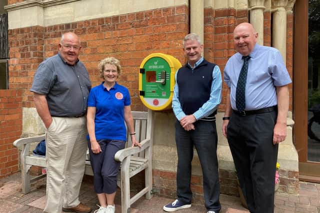Pictured with the new AED are (left to right): KHS Chairman Neil Morris, Seringa Dudley (a fellow KHS trustee and lead trainer); Mark Stevens the main funder and George Jones the church leader at Kenilworth URC. Picture supplied.