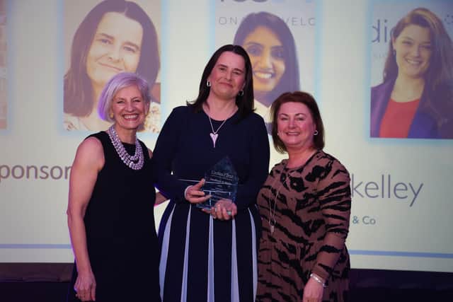 Amanda Chalmers receives the Excellence In Media Award from Erica Kemp and Julie McGarrigle of Alsters Kelley Solicitors. Photo by Dy Holme of Spaces and Faces Photography