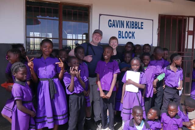 Gavin and Viv Kibble with some of the students at the new Gavin Kibble Block in Zambia. Photo supplied