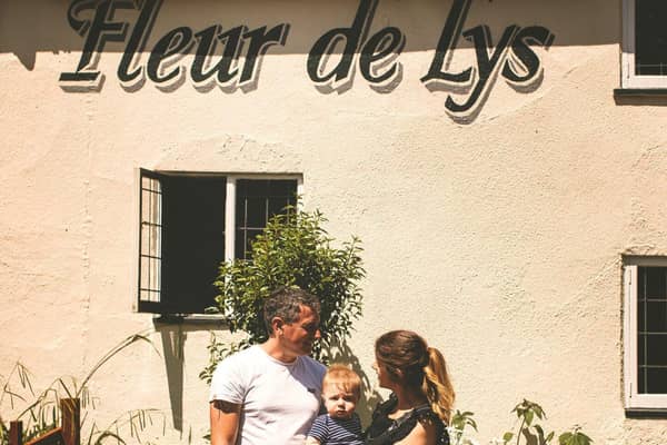 Nick and Emma Woodhouse with their first child outside the pub