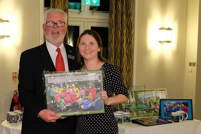 Warwick Avon Rotary Club president Norman Byrne with Helen from the runners up fancy dress team 'fast and fruitiest'.
