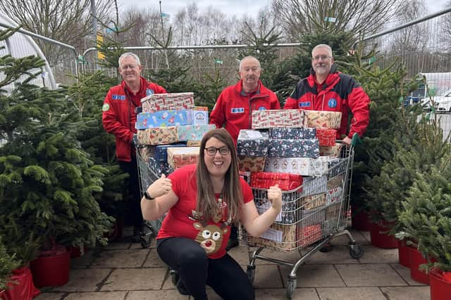 Alex Pearson, Morrison community champion with member of the Warwickshire Search and Rescue Team. Photo supplied