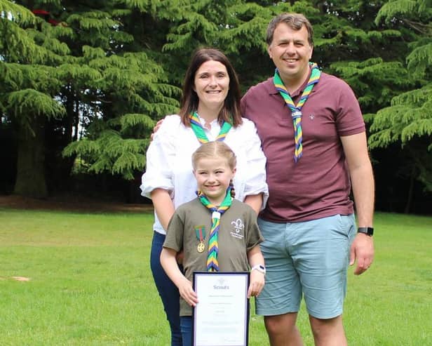 Liliane with her parents Sophie and Neil.