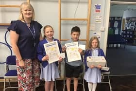 Budbrooke Primary School pupils Sophia Halford, Ben Ferreira, Florence Halford with Corinne Thomas head teacher at Budbrooke Primary School. Photo supplied