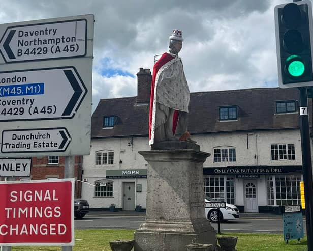 Lord John Scott has been temporarily transformed into the Queen.