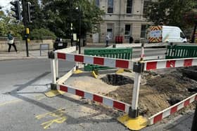 The emergency gas repair works taking place at the bottom of the parade