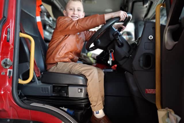 Connor's enjoys his visit to Rugby Fire Station.