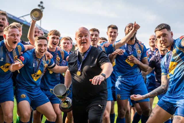 Leamington FC manager Paul Holleran and his players celebrate the playoff final victory