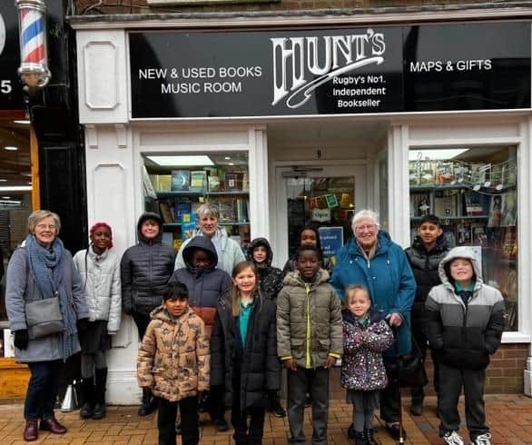 All smiles outside Hunt's bookshop.